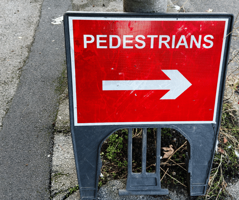 Pedestrian crossing at an urban intersection.